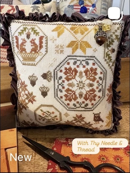 Beautifully finished cross-stitch pillow
